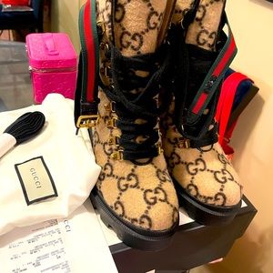 Gucci monogrammed boots